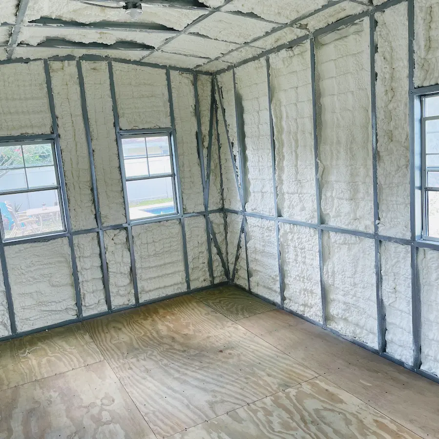 Closed-cell spray foam insulation applied to wall cavities in a residential project in Corona de Tucson